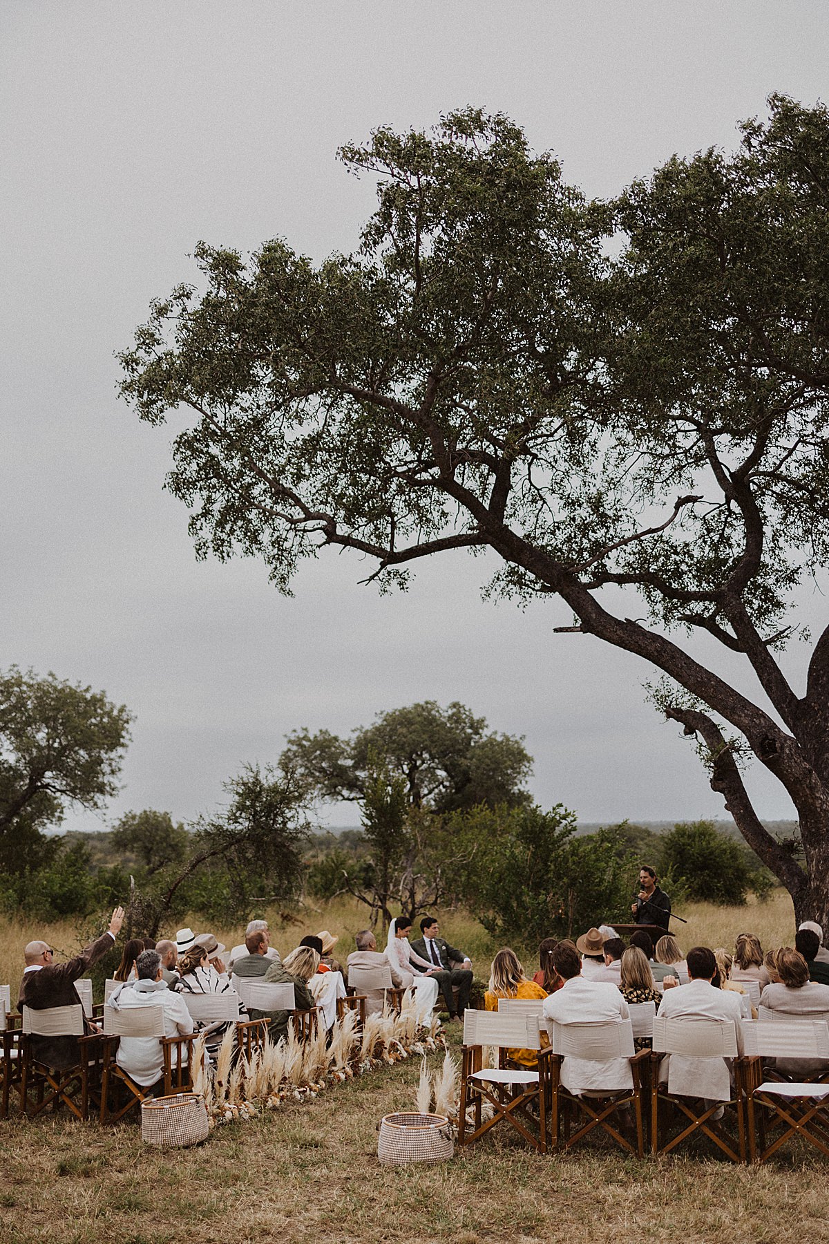 Ceremony out in the african bushveld surrounded by wildlife.
