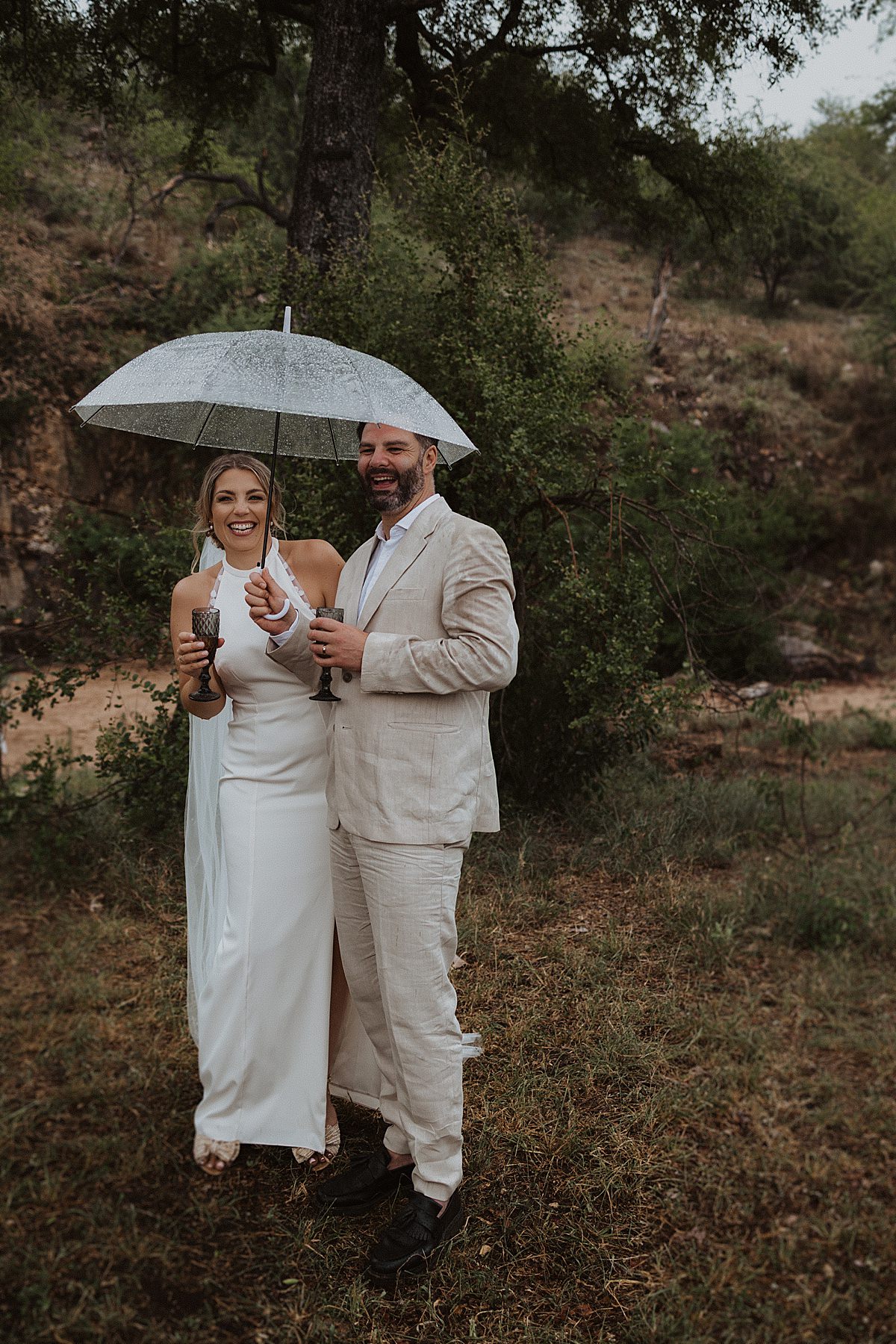 rainy wedding day for bride and groom